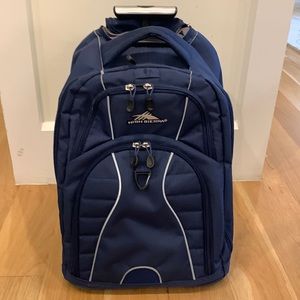COPY - Gently used High Sierra rolling backpack in navy